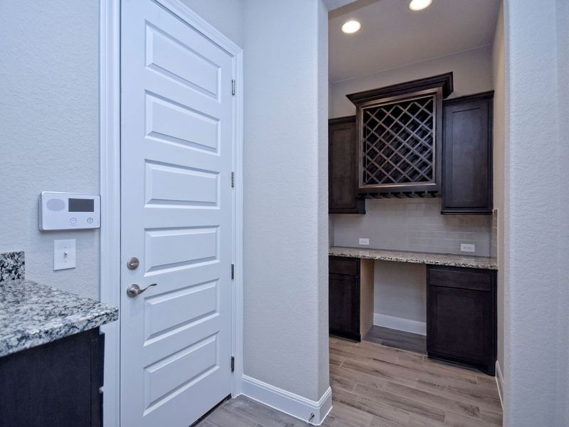 Representative furnished interior of a home built from the San Simeon I by Giddens Homes in Clearwater Ranch, Liberty Hill (Image 303).
