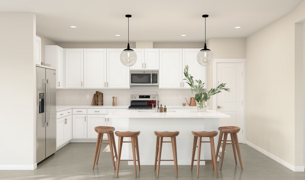 Kitchen with vast island & pendant lights