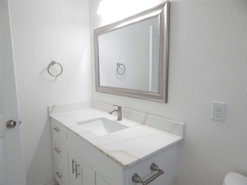 Furnished interior view inside a new home in Bridgeland, Cypress (Image 8).