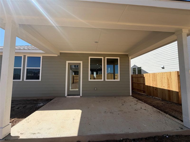Exterior details and patio area of a home in Lariat, Liberty Hill (Image 11).