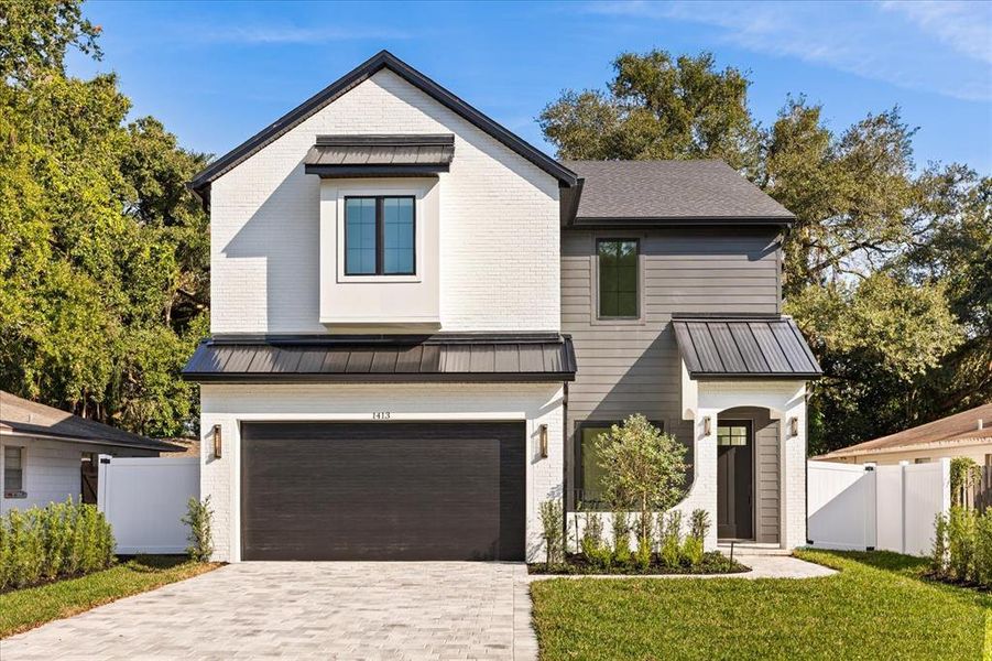 Front exterior of a new home in , Orlando, FL, highlighting curb appeal (Image 1). Front exterior of a new home in , Orlando, FL, highlighting curb appeal (Image 1).