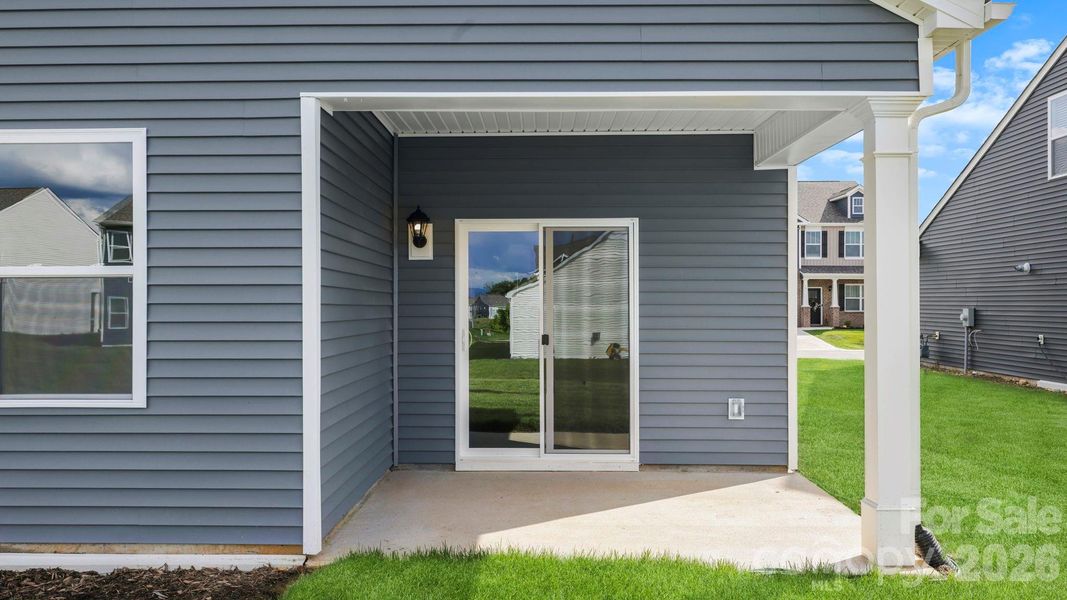 Exterior details and patio area of a home in Tap Root Farms, Fletcher (Image 2). Exterior details and patio area of a home in Tap Root Farms, Fletcher (Image 2).