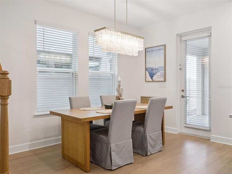 Furnished interior view inside a new home in Harvest at Ovation, Winter Garden (Image 8).