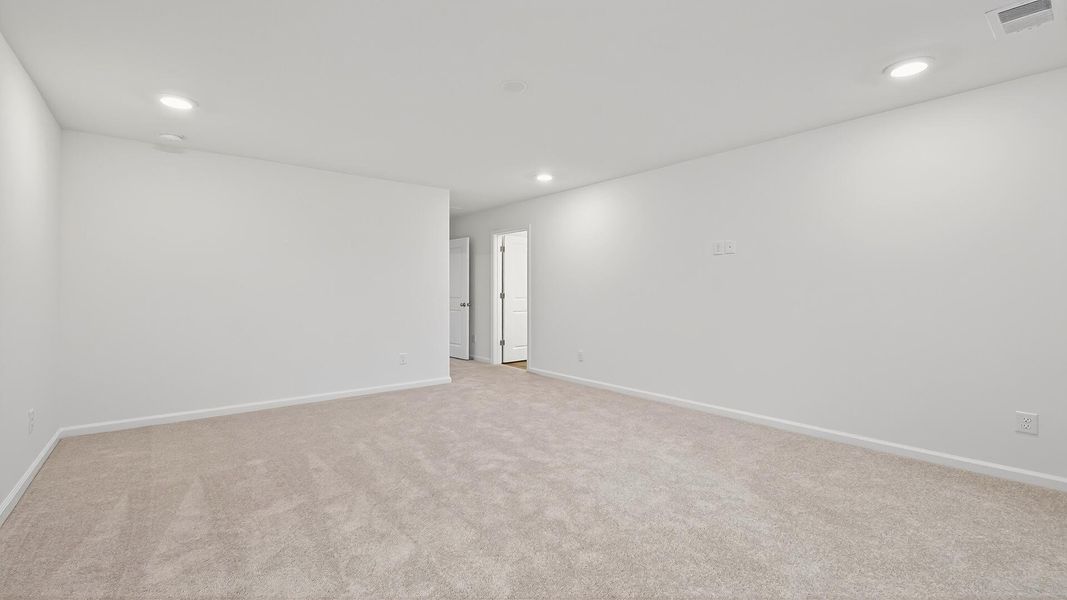 Spacious, unfurnished interior of a new home in Creekside at Andrews, Summerville (Image 24).