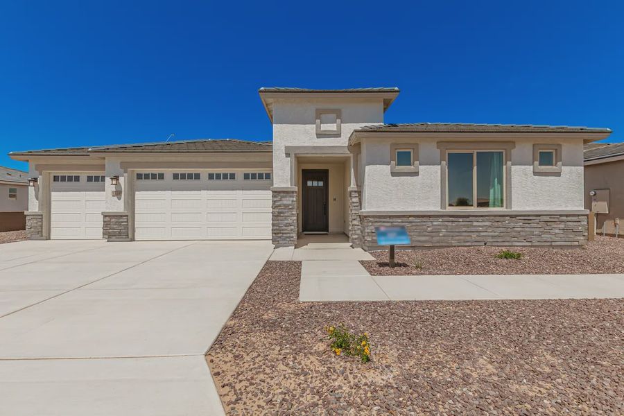 Representative exterior photo of a completed home built from the 2257 by Elliott Homes in Acacia at Santana, Yuma, AZ (Image 21).