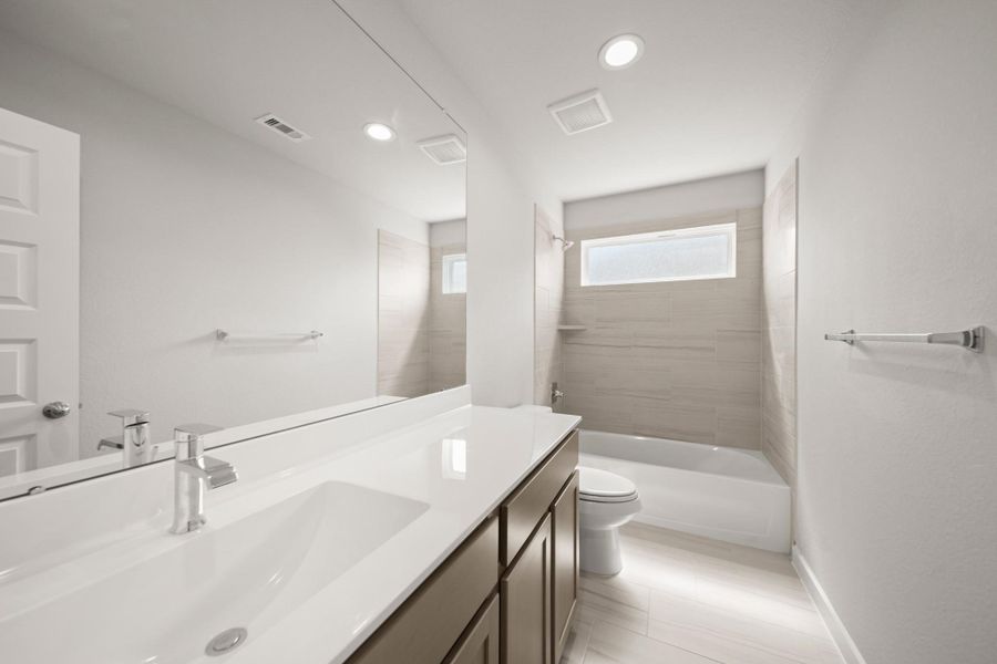 Furnished interior view inside a new home in Beacon Hill, Waller (Image 3). Furnished interior view inside a new home in Beacon Hill, Waller (Image 3).