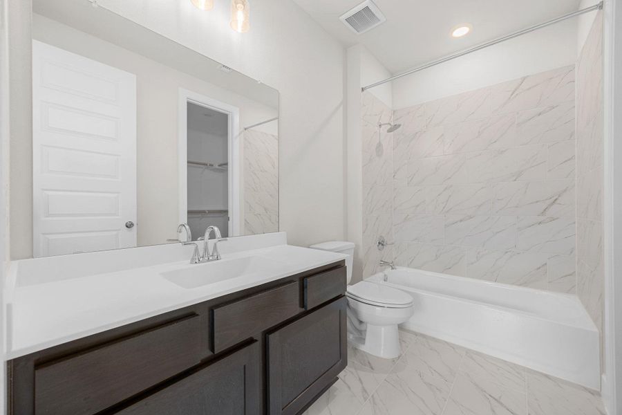 Furnished interior view inside a new home in The Colony, Bastrop (Image 12).
