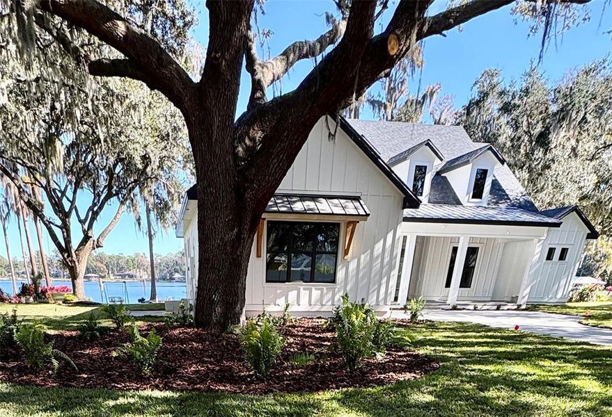 Front exterior of a new home in , Odessa, FL, highlighting curb appeal (Image 5).