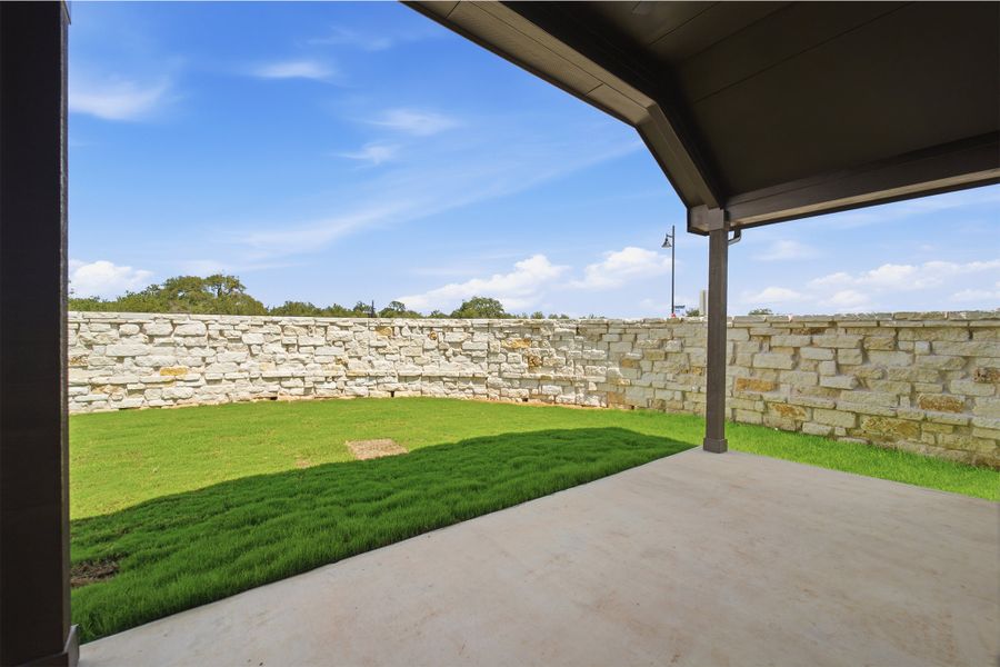Exterior details and patio area of a home in Santa Rita Ranch, Liberty Hill (Image 29).