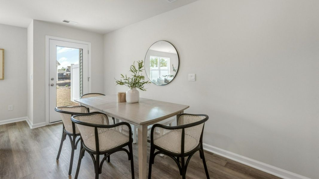 Representative furnished interior of a home built from the PEARSON TOWNHOME by D.R. Horton in Grayson Park Townhomes, Leland (Image 10).