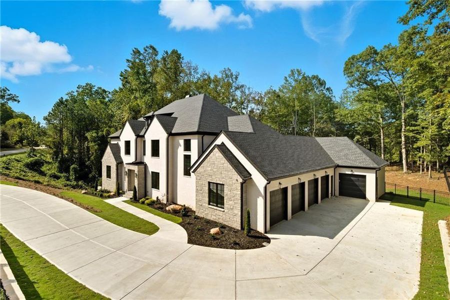 Front exterior of a new home in , Alpharetta, GA, highlighting curb appeal (Image 30).