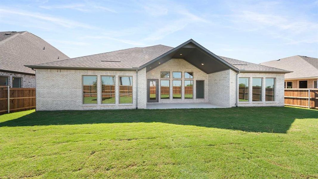 Exterior details and patio area of a home in North Sky 65', Celina (Image 3). Exterior details and patio area of a home in North Sky 65', Celina (Image 3).