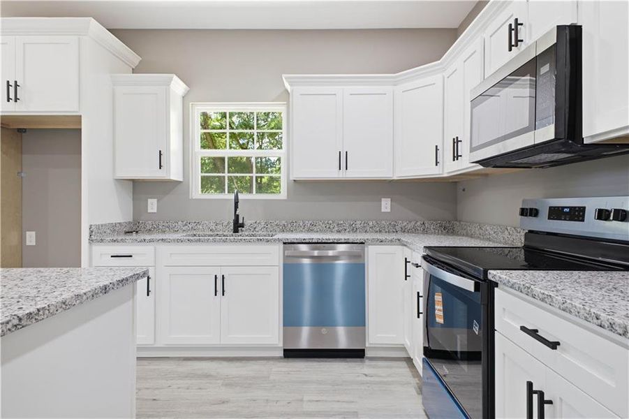 Furnished interior view inside a new home in , Calhoun (Image 7).