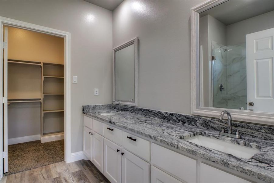 main bedroom bath with walk in closet