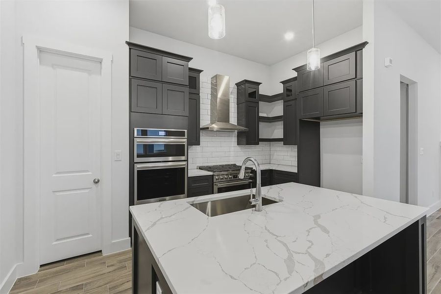 Representative furnished interior of a home built from the Oliver 2015 S TLT by Saratoga Homes in Lakeside at Tessera on Lake Travis, Lago Vista (Image 13).