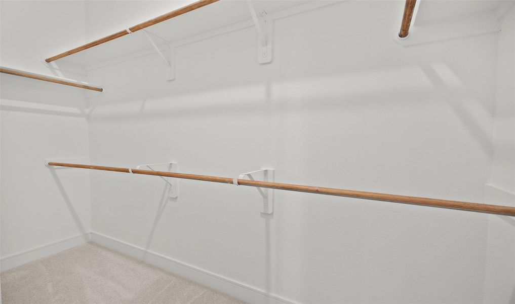 Primary walk-in closet (*Photo not of actual home and used for illustration purposes only.)