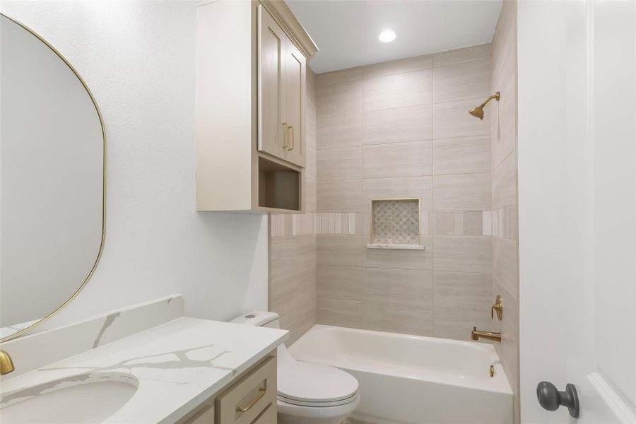 Secondary bathroom with tub shower. combination