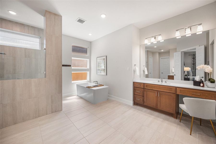Furnished interior view inside a new home in Woodson’s Reserve, Spring (Image 17).