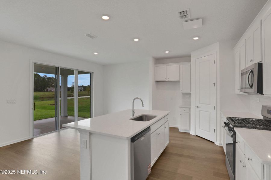 Furnished interior view inside a new home in TrailMark, St. Augustine (Image 13).
