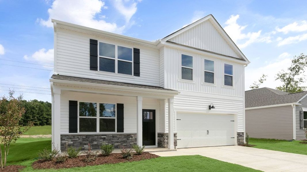 Front exterior of a new home in Shahbain Reserve, Raeford, NC, highlighting curb appeal (Image 2). Front exterior of a new home in Shahbain Reserve, Raeford, NC, highlighting curb appeal (Image 2).