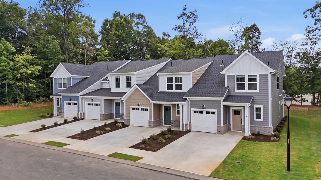 Front exterior of a new home in Pelham Crossing Villas, Greenville, SC, highlighting curb appeal (Image 2). Front exterior of a new home in Pelham Crossing Villas, Greenville, SC, highlighting curb appeal (Image 2).