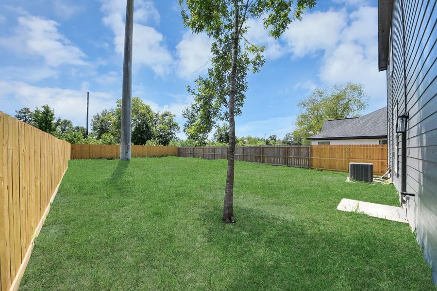 Exterior details and patio area of a home in , Huffman (Image 22).