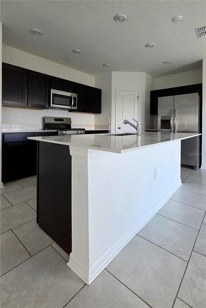 Furnished interior view inside a new home in Peace Creek Reserve, Winter Haven (Image 3).