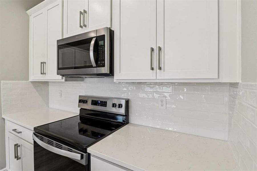 Furnished interior view inside a new home in Legends Preserve - Signature Series, Daytona Beach (Image 9).