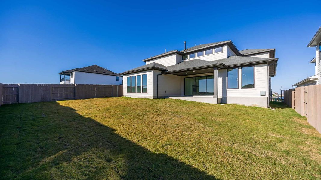 Exterior details and patio area of a home in Easton Park 60', Austin (Image 3).