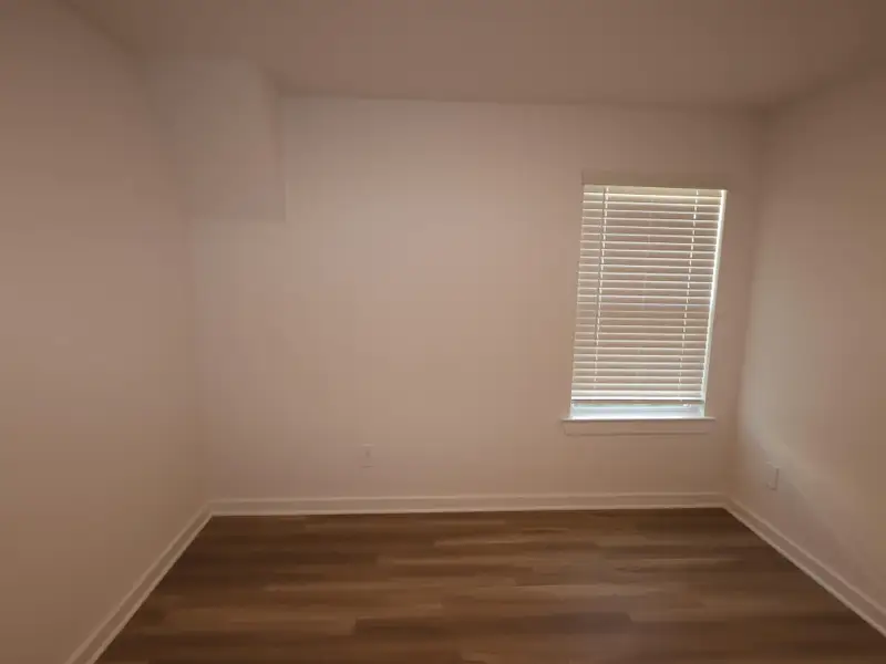 Spacious, unfurnished interior of a new home in Pinewood at Grand Texas, New Caney (Image 7).