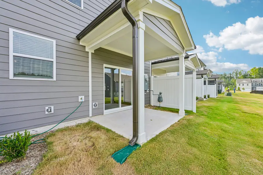Exterior details and patio area of a home in Forestville Station, Wake Forest (Image 3).