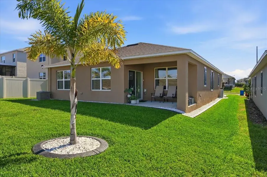 Exterior details and patio area of a home in Eden Hills, Lake Alfred (Image 3). Exterior details and patio area of a home in Eden Hills, Lake Alfred (Image 3).