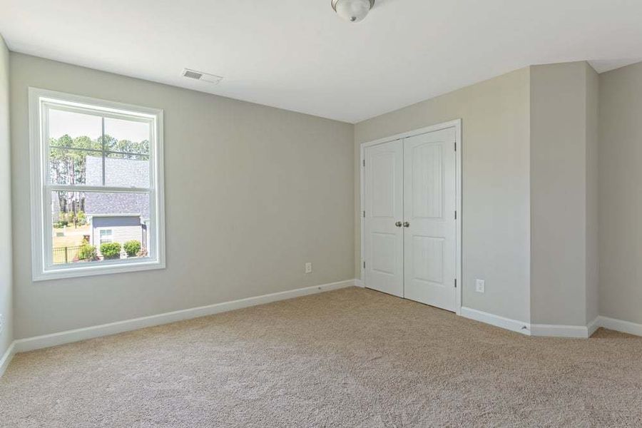 Representative unfurnished interior of a home built from the Brunswick by Caviness & Cates Communities in Maggie Way, Wendell (Image 103). Representative unfurnished interior of a home built from the Brunswick by Caviness & Cates Communities in Maggie Way, Wendell (Image 103).