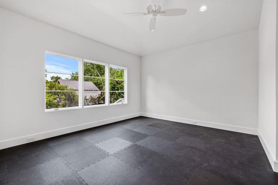 Spare room featuring ceiling fan