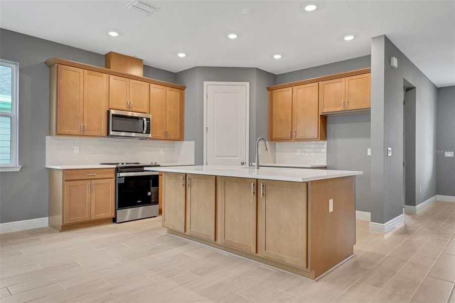 Furnished interior view inside a new home in Green Key Village, Lady Lake (Image 11). Furnished interior view inside a new home in Green Key Village, Lady Lake (Image 11).