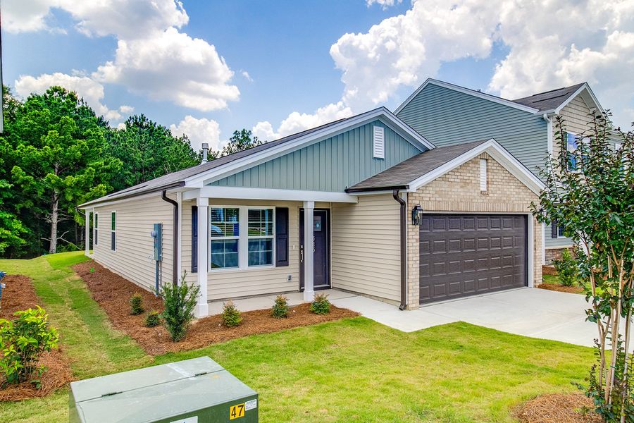 Front exterior of a new home in Bluefield, Lexington, SC, highlighting curb appeal (Image 20). Front exterior of a new home in Bluefield, Lexington, SC, highlighting curb appeal (Image 20).