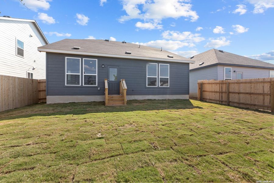 Exterior details and patio area of a home in Davis Ranch, San Antonio (Image 18).