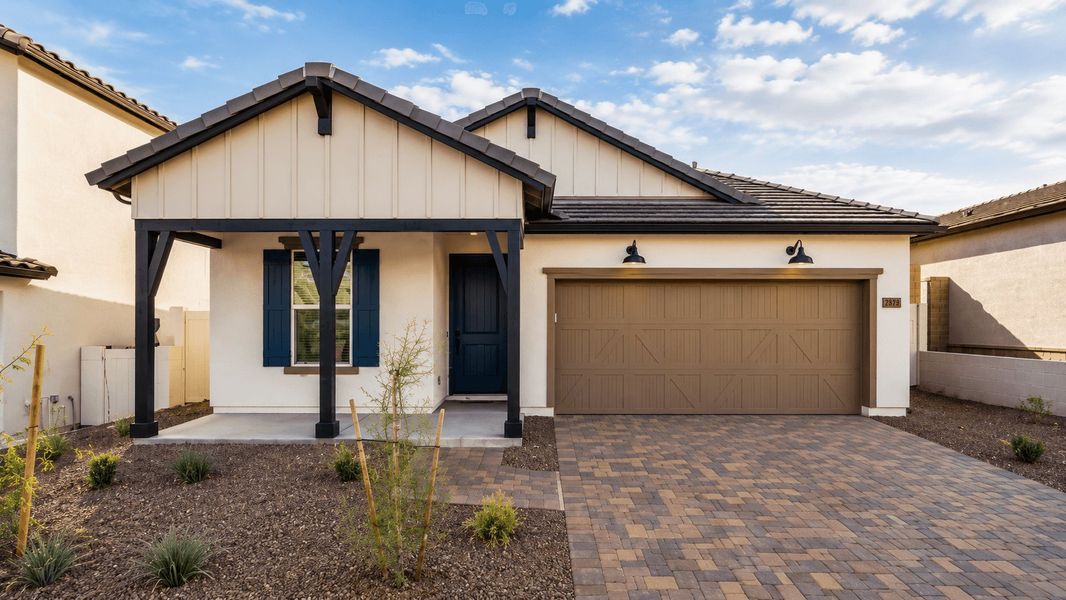 Representative exterior photo of a completed home built from the Saguaro by William Ryan Homes in The Ridge at Sienna Hills, Buckeye, AZ (Image 23).