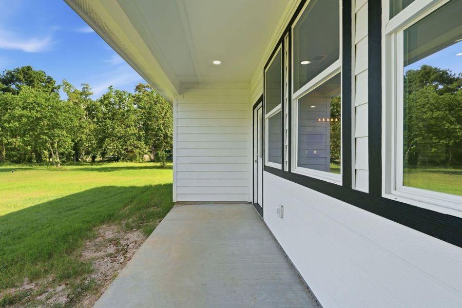 Exterior details and patio area of a home in , Conroe (Image 3). Exterior details and patio area of a home in , Conroe (Image 3).