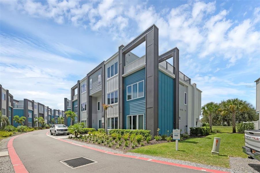 Front exterior of a new home in , Kissimmee, FL, highlighting curb appeal (Image 21).