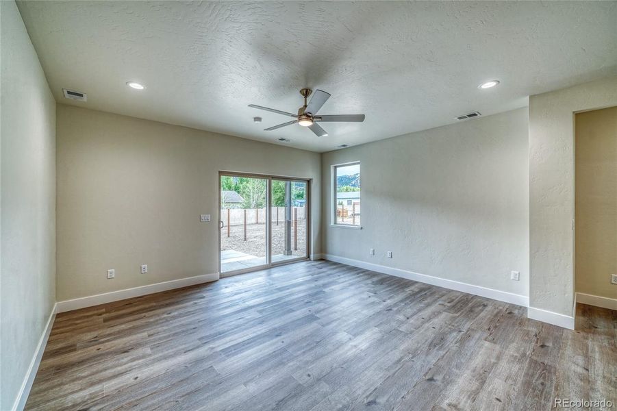 Living area with patio doors to backyard