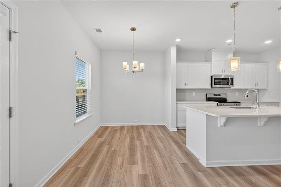 Furnished interior view inside a new home in Franklin Manor, Lawrenceville (Image 14). Furnished interior view inside a new home in Franklin Manor, Lawrenceville (Image 14).