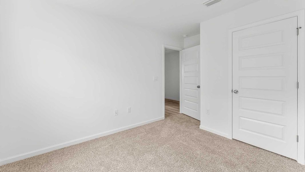 Spacious, unfurnished interior of a new home in Magnolia at the Bluffs Phase 3, Freeport (Image 21). Spacious, unfurnished interior of a new home in Magnolia at the Bluffs Phase 3, Freeport (Image 21).