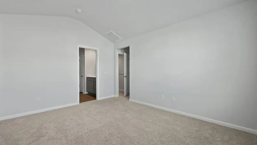 Spacious, unfurnished interior of a new home in Pine Hills Townhomes at Cane Bay, Summerville (Image 12). Spacious, unfurnished interior of a new home in Pine Hills Townhomes at Cane Bay, Summerville (Image 12).