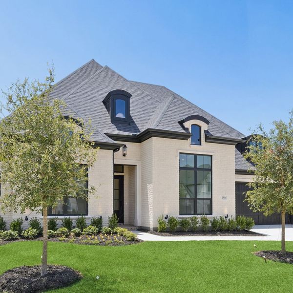 Front exterior of a new home in The Parks at Wilson Creek, Celina, TX, highlighting curb appeal (Image 26). Front exterior of a new home in The Parks at Wilson Creek, Celina, TX, highlighting curb appeal (Image 26).