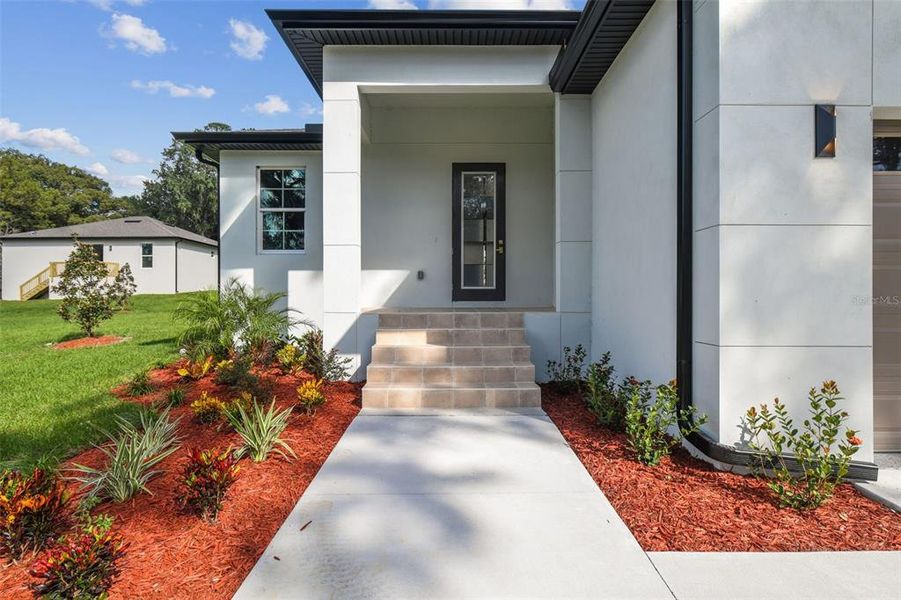 Exterior details and patio area of a home in , Brooksville (Image 30).