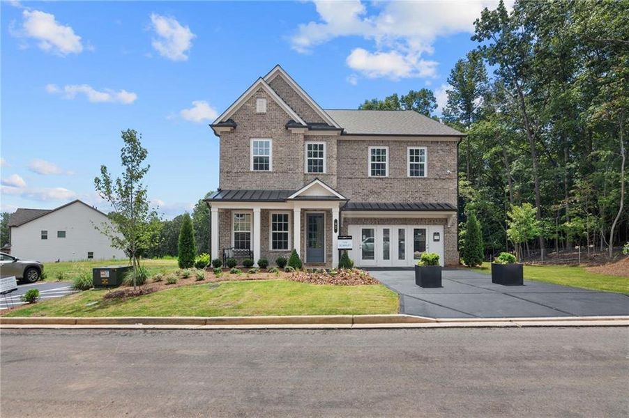 Front exterior of a new home in East Harbor II at Chestatee, Dawsonville, GA, highlighting curb appeal (Image 25).