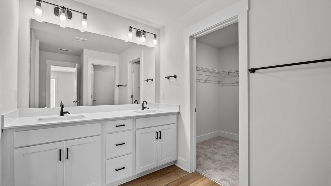 Representative furnished interior of a home built from the Jasmine by DRB Homes in Harrier Point, Woodruff (Image 26).