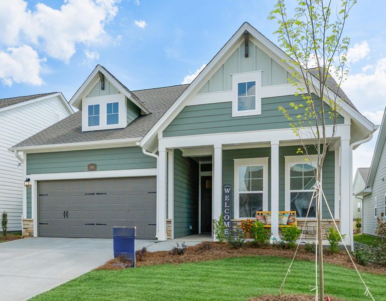Front exterior of a new home in Encore at Streamside - Classic Series, Waxhaw, NC, highlighting curb appeal (Image 1). Front exterior of a new home in Encore at Streamside - Classic Series, Waxhaw, NC, highlighting curb appeal (Image 1).
