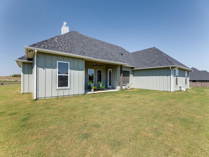 Exterior details and patio area of a home in , New Fairview (Image 24).